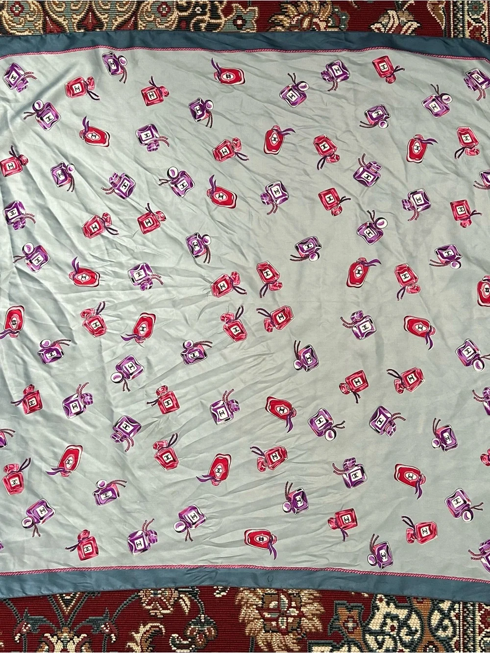 Chanel Light Blue Silk Scarf with Pink & Purple Perfume Motif